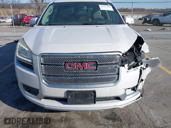 2016 GMC Acadia Denali with VIN 1GKKVTKD3GJ221449, listed as a IAAI auction lot 41777230 with 157,699 mi miles and . Bid and sale history available at DreamBid. Image 6.