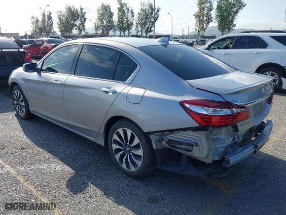 2017 Honda Accord Hybrid EX-L with VIN JHMCR6F5XHC004090, listed as a IAAI auction lot 41934241 with 241,638 mi miles. Bid and sale history available at carsss.com. Image 3.