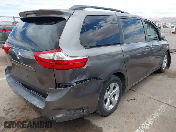 2015 Toyota Sienna LE AAS with VIN 5TDKK3DC8FS531431, listed as a IAAI auction lot 42372601 with 63,633 mi miles and . Bid and sale history available at DreamBid. Image 4.