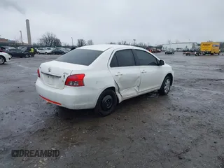 2009 Toyota Yaris z VIN JTDBT903594059923, wystawiony jako IAAI lot #41520883 z przebiegiem 141 366 mil mil oraz . Historia ofert i sprzedaży dostępna na DreamBid. Obrazek 4.