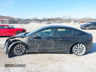 2022 Tesla Model 3 with VIN 5YJ3E1EA1NF304811, listed as a IAAI auction lot 41559342 with 29,597 mi miles and . Bid and sale history available at DreamBid. Image 13.