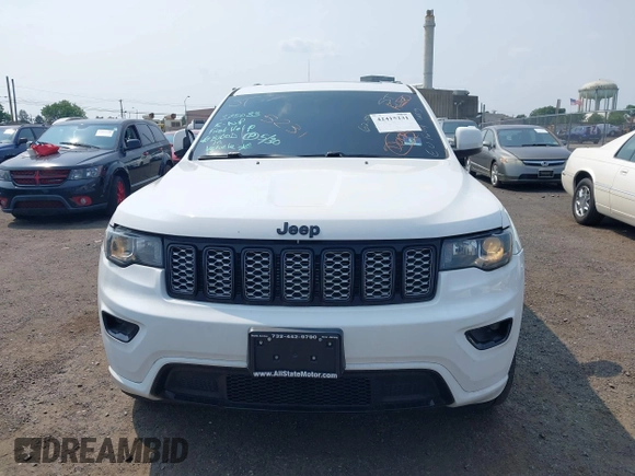 2020 Jeep Grand Cherokee Laredo E with VIN 1C4RJFAG5LC375033, listed as a IAAI auction lot 42415231 with 62,489 mi miles and . Bid and sale history available at DreamBid. Image 12.