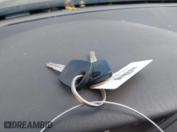 2004 Ford Focus with VIN 3FAHP31Z14R100908, listed as a IAAI auction lot 41894724 with 221,016 mi miles and . Bid and sale history available at DreamBid. Image 11.