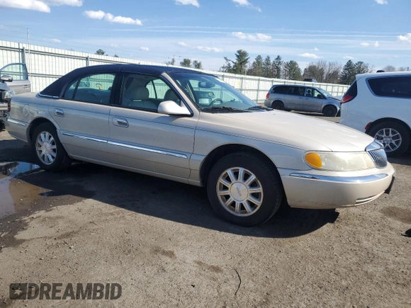 1999 Lincoln Continental with VIN 1LNHM97V1XY610090, listed as a Copart auction lot 50447685 with 105,375 mi miles and Clean title. Bid and sale history available at DreamBid. Image 4.