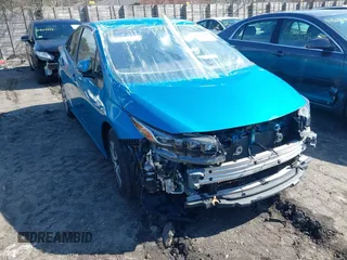 2021 Toyota Prius LE with VIN JTDKAMFP1M3166050, listed as a IAAI auction lot 41831145 with 54,350 mi miles and . Bid and sale history available at DreamBid. Image 1.