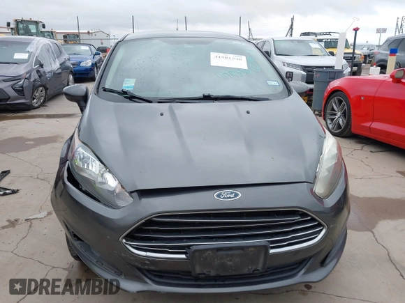 2018 Ford Fiesta SE with VIN 3FADP4BJXJM136232, listed as a IAAI auction lot 41901540 with 119,065 mi miles and . Bid and sale history available at DreamBid. Image 13.