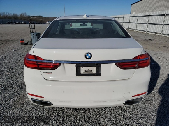 2017 BMW 7 Series 740i with VIN WBA7E2C32HG740649, listed as a Copart auction lot 45593145 with 122,793 mi miles and Salvage Title. Bid and sale history available at carsss.com. Image 6.