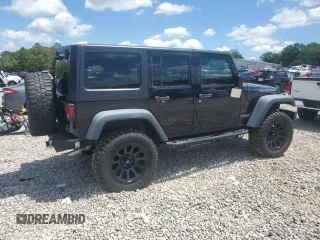 2015 Jeep Wrangler Unlimited Rubicon z VIN 1C4BJWFG2FL530863, wystawiony jako Copart lot #56345965 z przebiegiem 149 754 mil mil oraz Szkoda całkowita • Salvage title. Historia ofert i sprzedaży dostępna na DreamBid. Obrazek 3.
