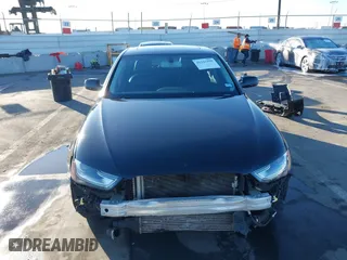 2016 Audi A4 Premium with VIN WAUAFAFL0GN008491, listed as a IAAI auction lot 41323195 with 90,777 mi miles. Bid and sale history available at carsss.com. Image 13.