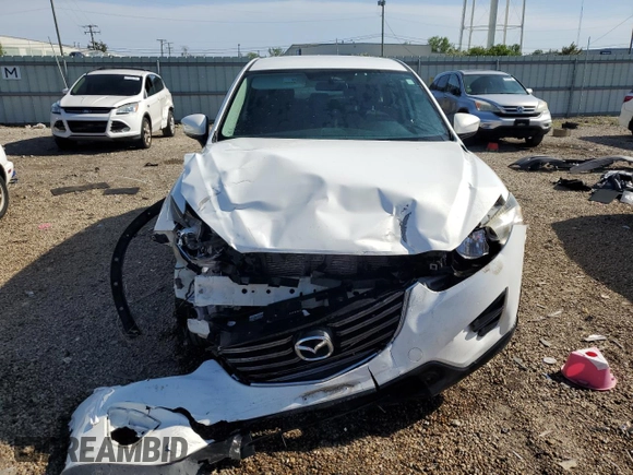 2016 Mazda CX-5 Sport с VIN JM3KE4BY1G0611368, выставлен на аукционе Copart как лот 56979385 с пробегом 106 397 миль миль и Списание • Salvage title. История ставок и продаж доступна на DreamBid. Изображение 5.