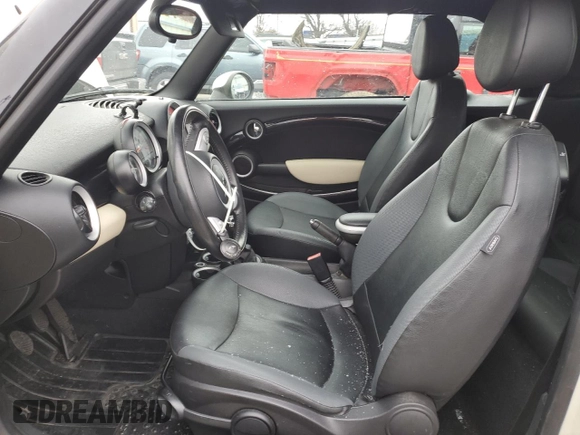 2010 MINI Convertible with VIN WMWMR3C56ATZ19689, listed as a Copart auction lot 45427705 with 134,319 mi miles and Clean Title. Bid and sale history available at DreamBid. Image 7.