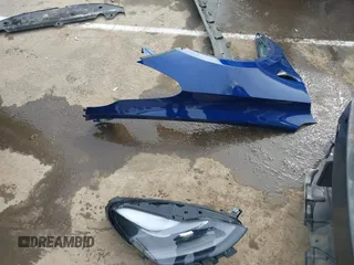2024 Tesla Model Y Long Range z VIN 7SAYGDEE9RA244657, wystawiony jako IAAI lot #41694621 z przebiegiem 12 991 mil mil oraz . Historia ofert i sprzedaży dostępna na DreamBid. Obrazek 12.