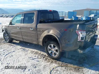 2015 Ford F-150 XLT with VIN 1FTEW1EP4FFC24409, listed as a IAAI auction lot 41306158 with 155,249 mi miles. Bid and sale history available at carsss.com. Image 3.