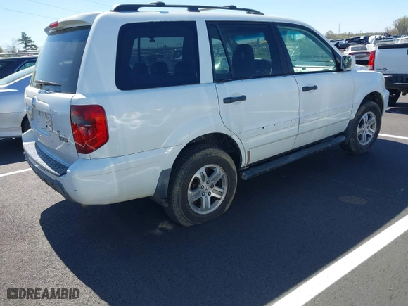 2003 Honda Pilot EX with VIN 2HKYF18693H511343, listed as a IAAI auction lot 41833640 with 300,640 mi miles. Bid and sale history available at carsss.com. Image 4.
