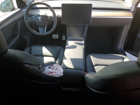 2023 Tesla Model Y Performance with VIN 7SAYGDEF2PF828973, listed as a Copart auction lot 45276585 with 15,750 mi miles and Salvage Title. Bid and sale history available at DreamBid. Image 8.