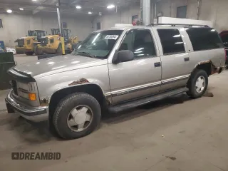 1999 GMC Suburban z VIN 3GKFK16R4XG540882, wystawiony jako Copart lot #80780884 z przebiegiem 209 819 mil mil oraz Czysty tytuł • Clean title. Historia ofert i sprzedaży dostępna na DreamBid. Obrazek 1.
