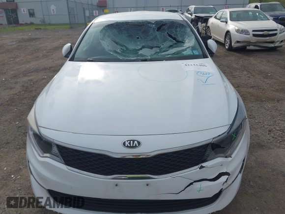 2017 Kia Optima LX z VIN 5XXGT4L38HG171236, wystawiony jako IAAI lot #42215406 z przebiegiem 83 107 mil mil oraz . Historia ofert i sprzedaży dostępna na DreamBid. Obrazek 12.