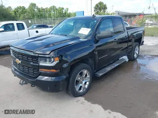 2018 Chevrolet Silverado 1500 Custom with VIN 1GCRCPEC3JZ329430, listed as a IAAI auction lot 42122097 with 199,580 mi miles. Bid and sale history available at carsss.com. Image 18.