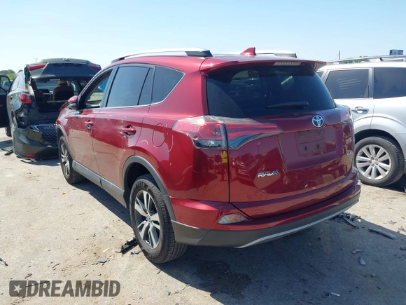 2018 Toyota RAV4 XLE with VIN 2T3WFREV8JW425464, listed as a IAAI auction lot 41977877 with 142,265 mi miles and . Bid and sale history available at carsss.com. Image 3.