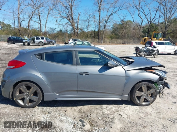2015 Hyundai Veloster Turbo with VIN KMHTC6AE8FU229198, listed as a IAAI auction lot 41596345 with 74,943 mi miles. Bid and sale history available at carsss.com. Image 13.