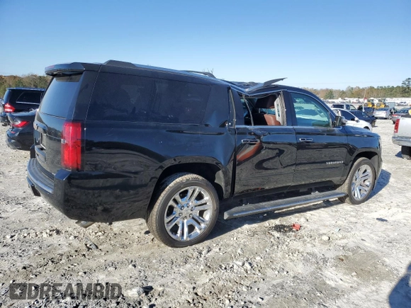 2019 Chevrolet Suburban Premier with VIN 1GNSKJKJXKR323704, listed as a Copart auction lot 72757214 with 150,404 mi miles and Salvage Title. Bid and sale history available at DreamBid. Image 3.