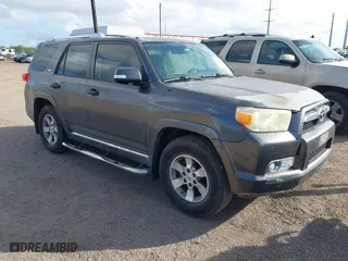 2011 Toyota 4Runner SR5 with VIN JTEZU5JR9B5026507, listed as a IAAI auction lot 41112035 with 128,126 mi miles. Bid and sale history available at carsss.com. Image 1.