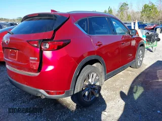 2020 Mazda CX-5 Grand Touring with VIN JM3KFADM8L0846818, listed as a IAAI auction lot 41224843 with 123,554 mi miles. Bid and sale history available at carsss.com. Image 4.