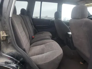 1998 Jeep Grand Cherokee Laredo with VIN 1J4GZ58S2WC281923, listed as a Copart auction lot 44010885 with 210,959 mi miles and Salvage Title. Bid and sale history available at carsss.com. Image 11.
