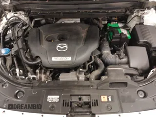 2019 Mazda CX-5 Signature with VIN JM3KFBEY5K0520593, listed as a IAAI auction lot 41638594 with 111,504 mi miles. Bid and sale history available at carsss.com. Image 10.