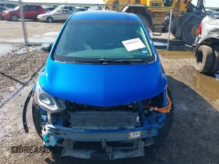 2021 Chevrolet Bolt EV LT z VIN 1G1FY6S05M4100363, wystawiony jako IAAI lot #42091631 z przebiegiem 26 812 mil mil oraz . Historia ofert i sprzedaży dostępna na DreamBid. Obrazek 13.