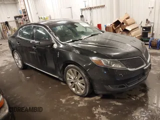 2013 Lincoln MKS EcoBoost with VIN 1LNHL9FT1DG614189, listed as a IAAI auction lot 41549635 with 180,043 mi miles. Bid and sale history available at carsss.com. Image 1.