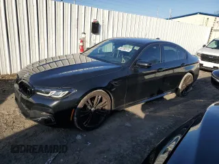 2023 BMW M5 with VIN WBS83CH07PCL16321, listed as a Copart auction lot 69708574 with 11,083 mi miles and Salvage Title. Bid and sale history available at carsss.com. Image 1.
