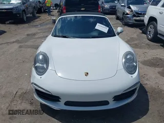 2014 Porsche 911 Carrera S z VIN WP0CB2A97ES154099, wystawiony jako IAAI lot #42264557 z przebiegiem 89 991 mil mil oraz . Historia ofert i sprzedaży dostępna na DreamBid. Obrazek 12.