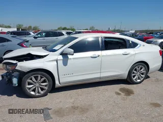 2018 Chevrolet Impala LT with VIN 1G1105S34JU106107, listed as a IAAI auction lot 41871693 with 111,412 mi miles and . Bid and sale history available at DreamBid. Image 14.