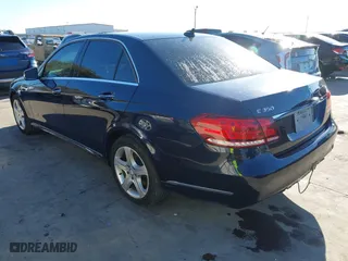 2014 Mercedes-Benz E-Class E 350 Luxury with VIN WDDHF8JBXEB068470, listed as a IAAI auction lot 40914692 with 96,308 mi miles. Bid and sale history available at carsss.com. Image 3.