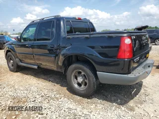 2005 Ford Explorer Sport Trac XLS with VIN 1FMZU67K65UA29830, listed as a Copart auction lot 54941185 with 214,220 mi miles and Salvage title. Bid and sale history available at DreamBid. Image 2.