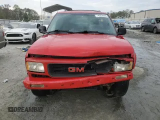 1996 GMC Jimmy SL with VIN 1GKDT13WXT2502347, listed as a Copart auction lot 74502444 with 253,735 mi miles and Salvage Title. Bid and sale history available at carsss.com. Image 5.