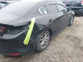 2021 Mazda 3 S с VIN 3MZBPAAL8MM201924, выставлен на аукционе IAAI как лот 40977248 с пробегом 89 894 миль миль и . История ставок и продаж доступна на DreamBid. Изображение 6.