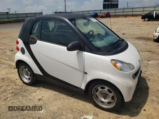 2009 Smart fortwo Pure with VIN WMEEJ31X19K216555, listed as a Copart auction lot 64412765 with 74,152 mi miles and Clean title. Bid and sale history available at DreamBid. Image 4.