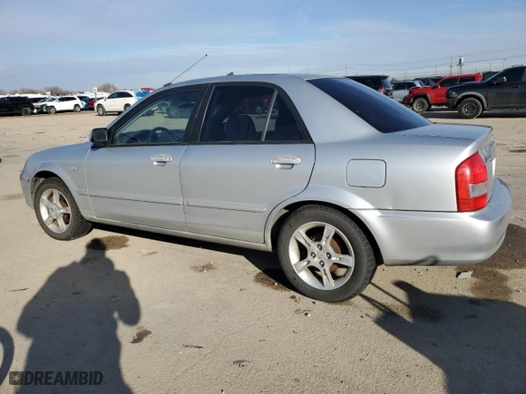 2003 Mazda Protege DX with VIN JM1BJ225930139588, listed as a Copart auction lot 85959354 with 226,798 mi miles and Salvage Title. Bid and sale history available at carsss.com. Image 2.