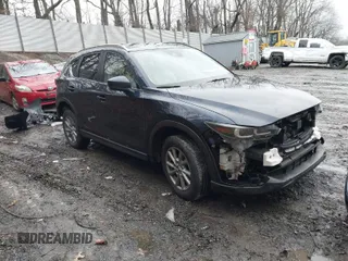 2023 Mazda CX-5 2.5 S Carbon Edition with VIN JM3KFBCM3P0244020, listed as a IAAI auction lot 41693880 with 26,342 mi miles. Bid and sale history available at carsss.com. Image 1.