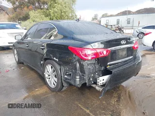 2014 Infiniti Q50 with VIN JN1BV7AP8EM675841, listed as a IAAI auction lot 41582924 with 139,637 mi miles. Bid and sale history available at carsss.com. Image 3.