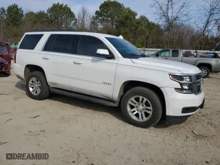 2019 Chevrolet Tahoe LT with VIN 1GNSKBKC8KR392771, listed as a Copart auction lot 46893785 with 125,161 mi miles and Salvage Title. Bid and sale history available at carsss.com. Image 4.