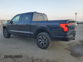 2023 Ford F-150 Lightning Pro with VIN 1FTVW1EV1PWG16263, listed as a Copart auction lot 54439535 with 12,023 mi miles and Salvage Title. Bid and sale history available at DreamBid. Image 2.