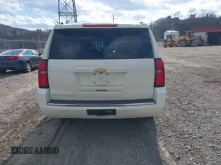 2015 Chevrolet Suburban LTZ with VIN 1GNSKKKC4FR304532, listed as a IAAI auction lot 41899860 with 123,624 mi miles. Bid and sale history available at carsss.com. Image 16.