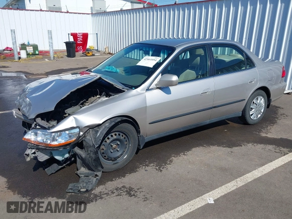 1999 Honda Accord LX with VIN JHMCG5545XC028563, listed as a IAAI auction lot 42461054 with 212,100 mi miles and . Bid and sale history available at DreamBid. Image 18.