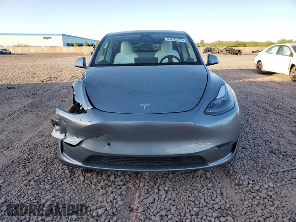 2024 Tesla Model Y Long Range z VIN 7SAYGAEEXRF211507, wystawiony jako Copart lot #56432715 z przebiegiem Nie podano mil oraz Szkoda całkowita • Salvage title. Historia ofert i sprzedaży dostępna na DreamBid. Obrazek 5.