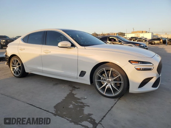 2022 Genesis G70 2.0T with VIN KMTG34TA7NU103693, listed as a Copart auction lot 73323644 with 10,901 mi miles and Salvage Title. Bid and sale history available at carsss.com. Image 4.