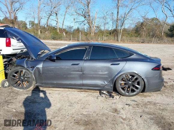 2022 Tesla Model S with VIN 5YJSA1E54NF488443, listed as a IAAI auction lot 41289281 with Not Provided miles and . Bid and sale history available at DreamBid. Image 14.