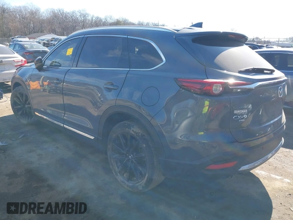 2021 Mazda CX-9 Grand Touring with VIN JM3TCBDY1M0505302, listed as a IAAI auction lot 41649151 with 67,183 mi miles and . Bid and sale history available at carsss.com. Image 3.